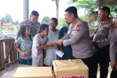 Polres Pelalawan Berikan Bansos Natal Kepada Masyarakat Kurang Mampu dan Berkebutuhan Khusus
