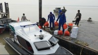 Polres Pelalawan Salurkan Ratusan Paket Sembako untuk Warga Pesisir Kuala Kampar