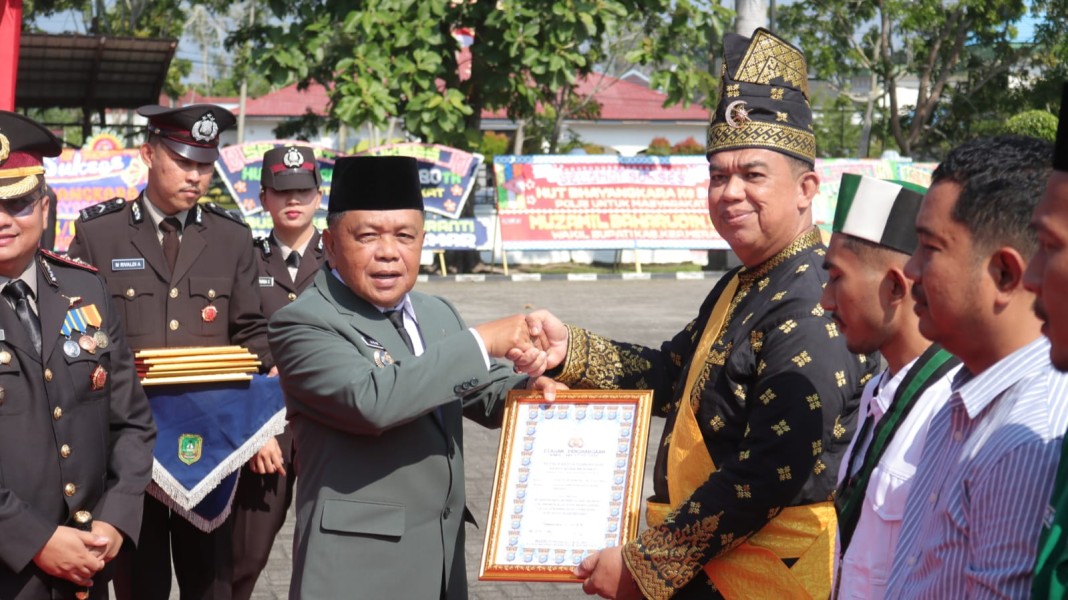 Bupati Asmar Hadiri Peringatan Hari Bhayangkara ke-80 di Meranti